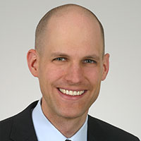 Dr. Luzius Neubert