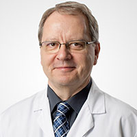 Dr. med. Guido Schüpfer MBA PhD